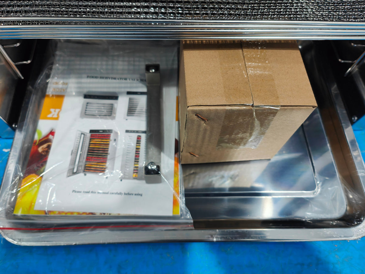 H-HGJ10X food dehydrator interior with stainless steel trays, instruction manual and packaged accessories
