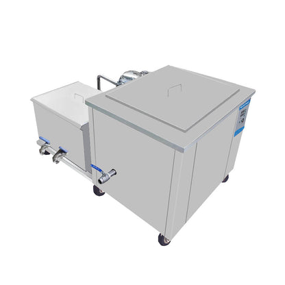 Rear side view of industrial ultrasonic cleaner showing stainless steel tanks and drainage connections